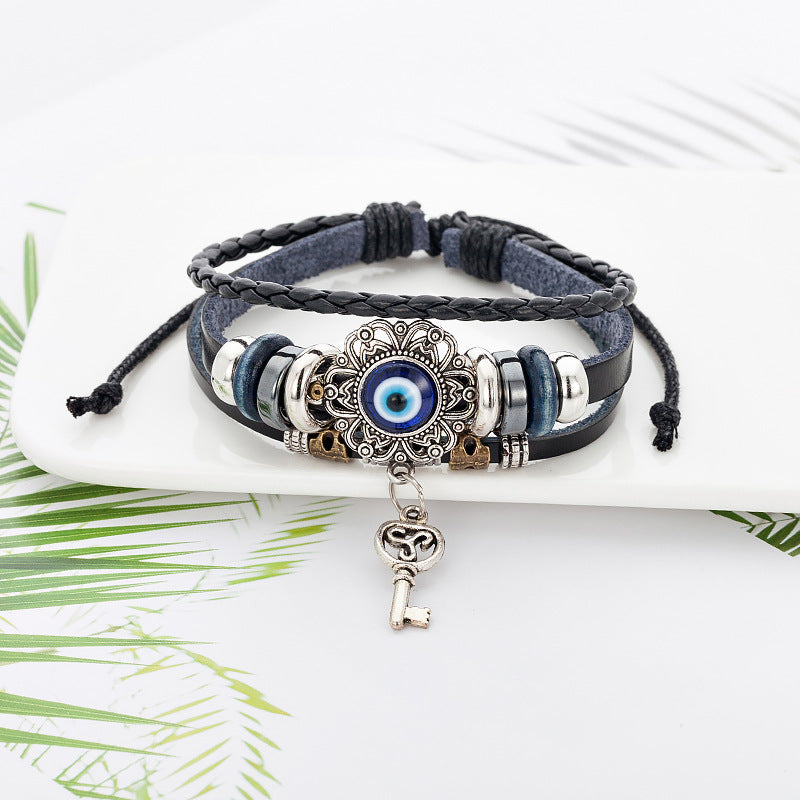 Cowhide bracelet & Hollow alloy insert Evil eye