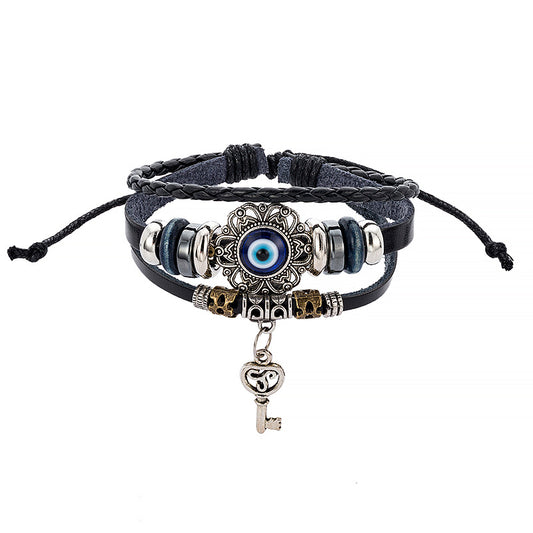 Cowhide bracelet & Hollow alloy insert Evil eye